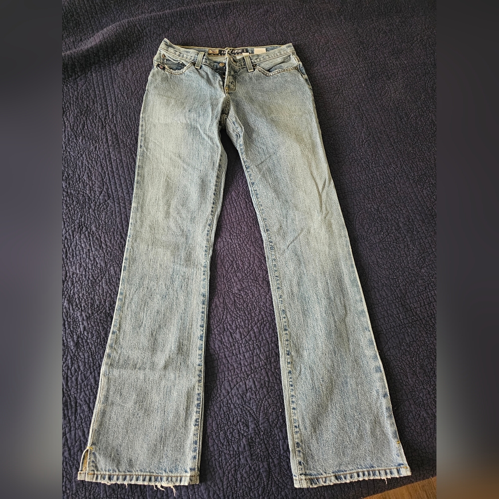 Stone wash distressed boot cut jeans